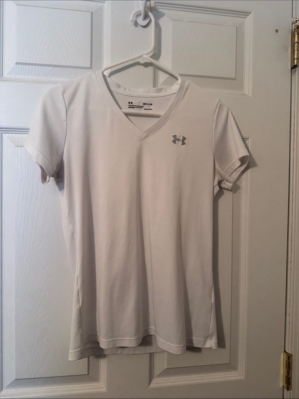 Under Armour Women’s White V-Neck Performance Tee with Gray Logo